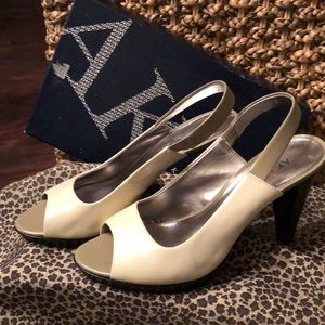 A K  Tri-colored peep toe heels.